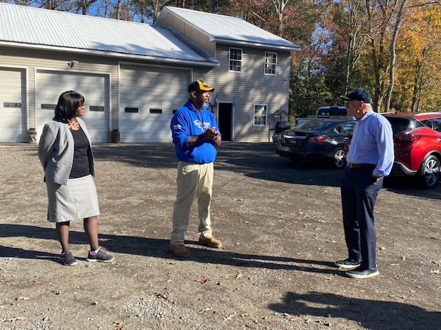 Tyrone Gale, Sussex Septic Services owner and a U.S. Army veteran, talks business with U.S. Sen. Tom Carper and SBA Delaware Director Michelle Harris, left, about his experiences as a small business entrepreneur. Gale discussed the SBA financing and other resources that supported his business startup and growth.